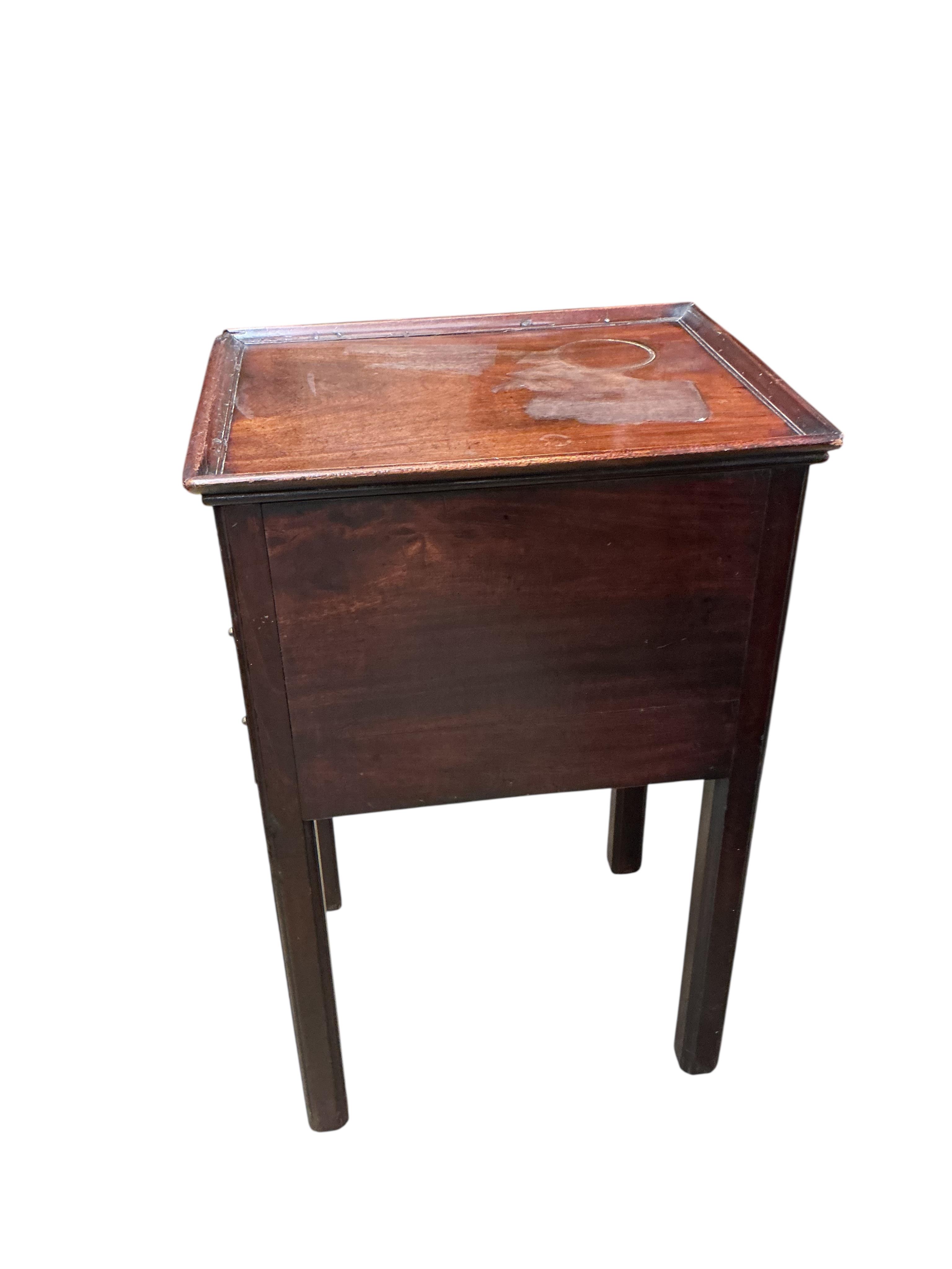 A George III mahogany three drawer bedside chest, width 38cm, depth 49cm, height 76cm